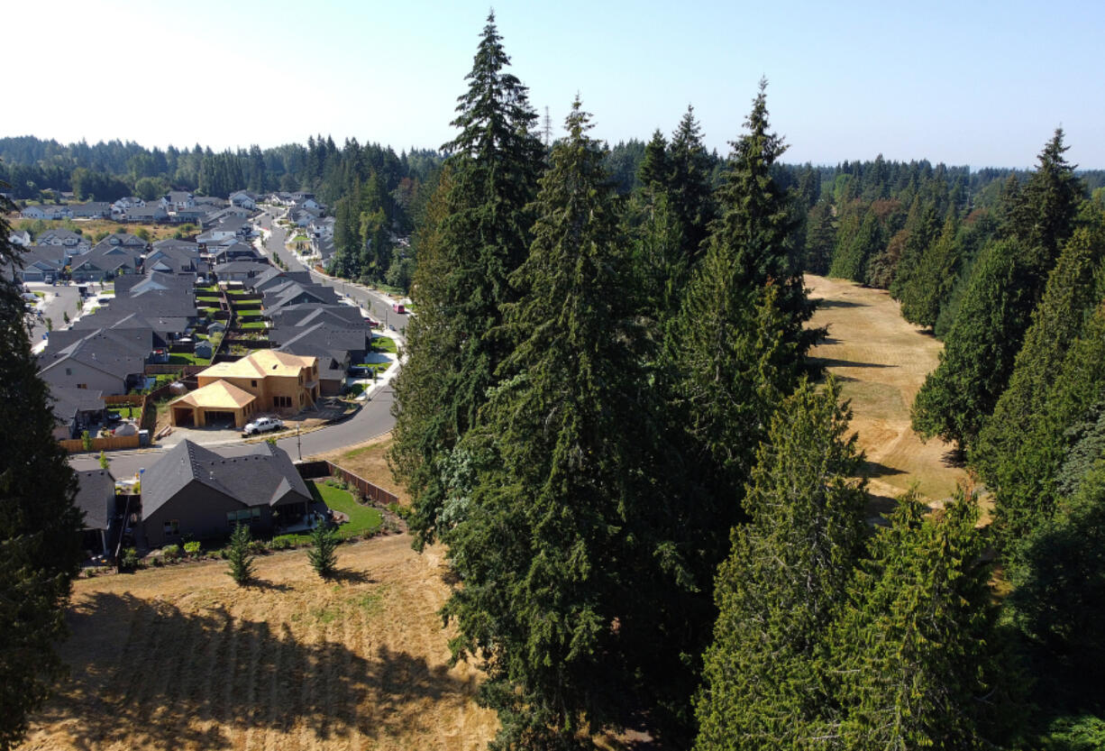 Clark County officials approved the purchase of the former Cedars on Salmon Creek golf course for $2.57 million. Residents in the area were worried the property, which will be left as a greenway, was headed for housing development.