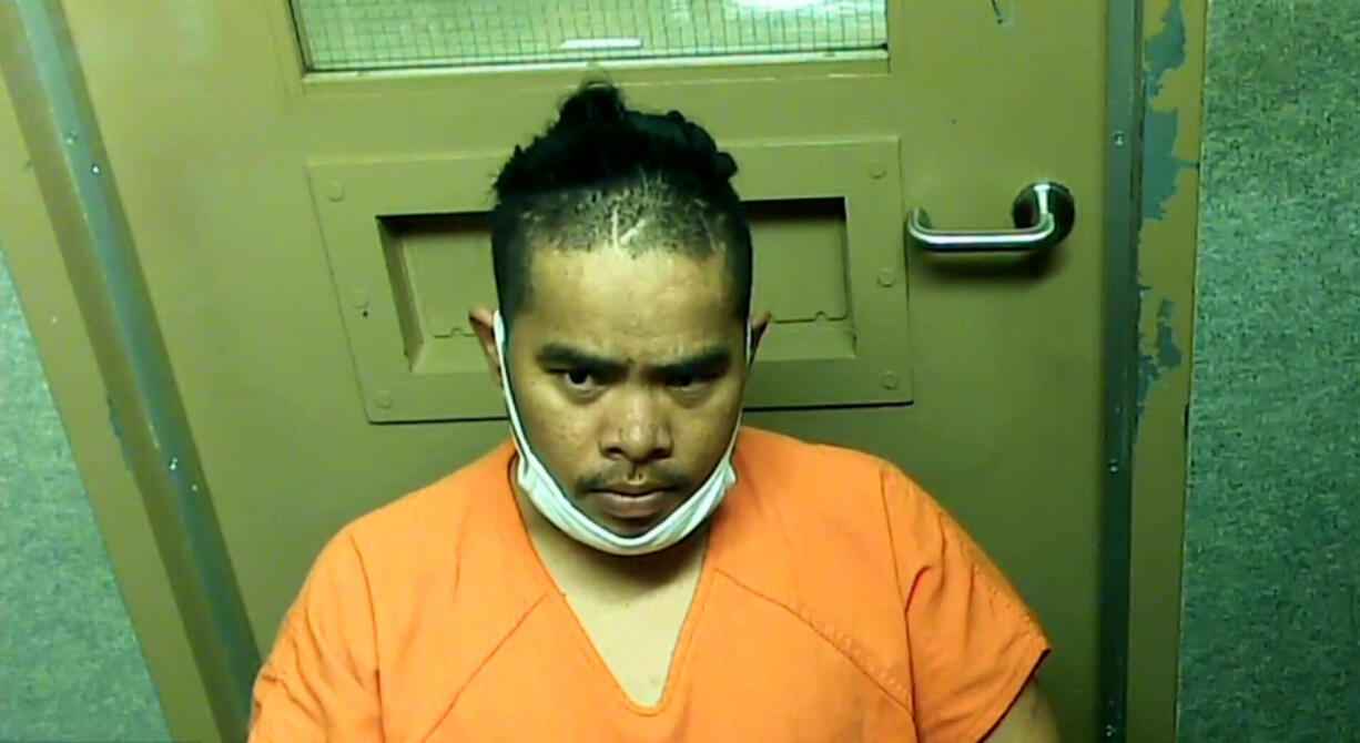 Ttong John, 30, of Vancouver appears Tuesday in Clark County Superior Court on suspicion of first-degree robbery and hit-and-run resulting in injury. He is accused of stealing a man's car Aug. 16 in the Minnehaha area and running over the man as he tried to stop John.