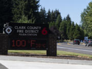 A sign displays a temperature of 100 degrees in August 2022, at the Clark County Fire District 6 Station in Felida.