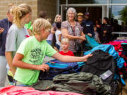 Hundreds of Woodland students received free backpacks filled with school supplies at Woodland Public Schools' sixth annual Back to School Bash on Aug. 20.