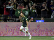 Portland Timbers midfielder Sebastián Blanco celebrates after scoring a goal during the second half of an MLS soccer match against the Seattle Sounders in Portland, Ore., Friday, Aug. 26, 2022. The Timbers won 2-1.