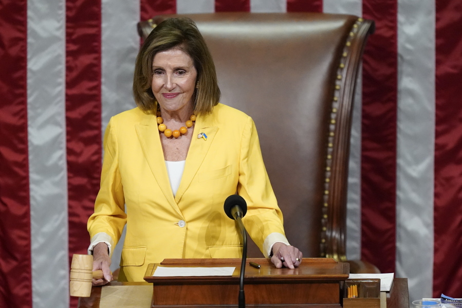 House Speaker Nancy Pelosi of Calif., finishes the vote to approve the Inflation Reduction Act in the House chamber at the Capitol in Washington, Friday, Aug. 12, 2022. A divided Congress gave final approval Friday to Democrats' flagship climate and health care bill.