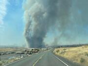 The Adams County Sheriff's Office is evacuating the town of Lind due to a wildfire in the area.