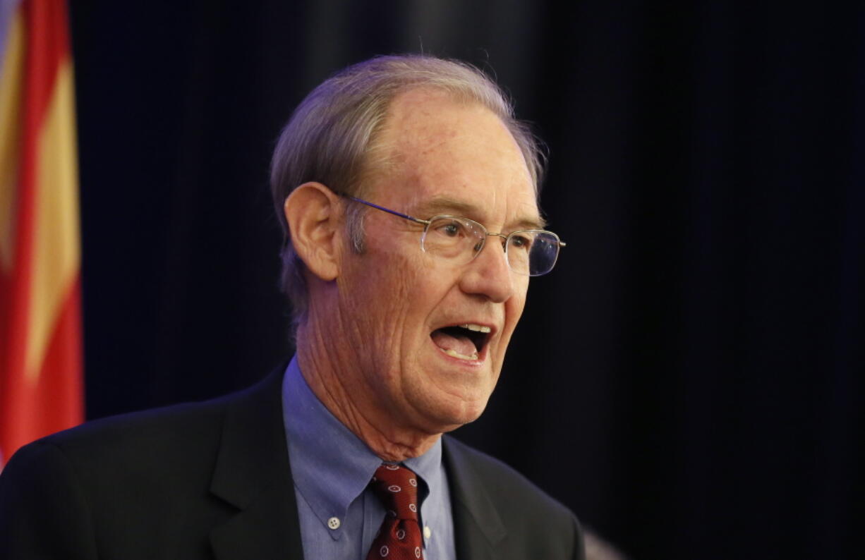 FILE - Terry Goddard speaks during an election night party on Nov. 4, 2014, in Phoenix. Republican Arizona Gov. Doug Ducey and the GOP leaders of the state House and Senate are urging the state Supreme Court to overrule lower court judges and block three voter initiatives from the ballot. Goddard, a former Arizona attorney general is among a bipartisan group including business figures backing an initiative requiring full disclosure of political spending.