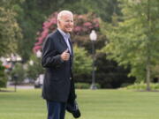 President Joe Biden walks to board Marine One on the South Lawn of the White House in Washington, on his way to his Rehoboth Beach, Del., home after his most recent COVID-19 isolation, Sunday, Aug. 7, 2022.