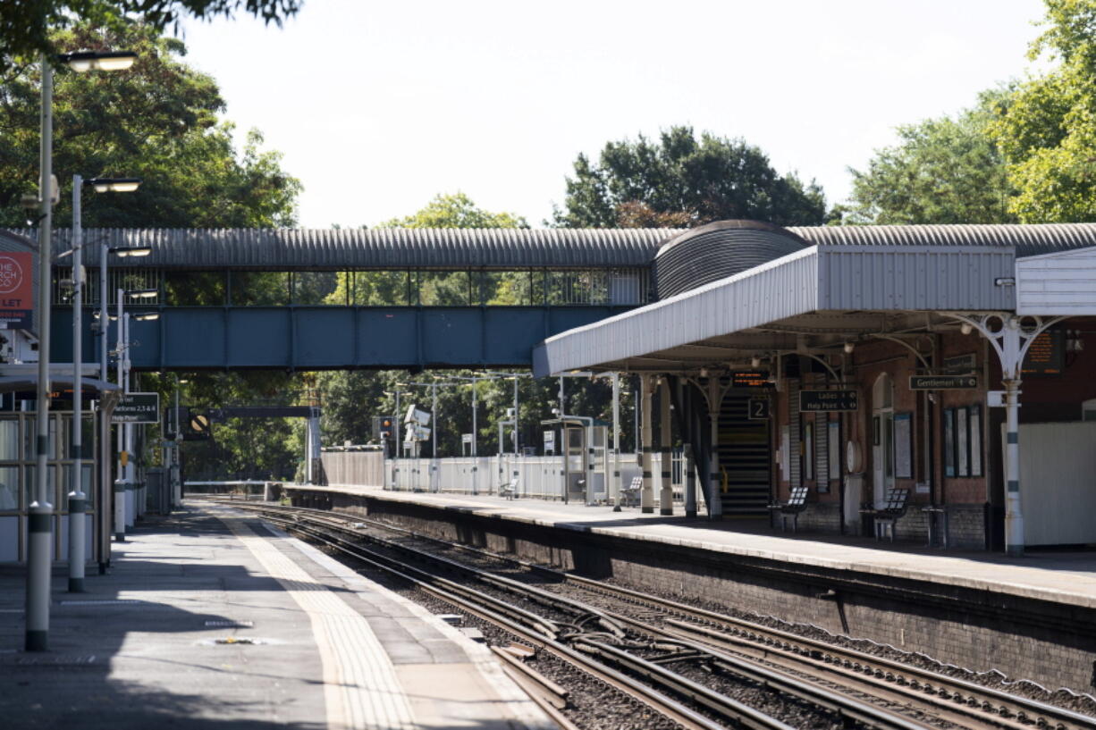 Empty platforms at Wandsworth Common Station in south London, Saturday Aug. 12, 2022. Rail services are set to be severely disrupted as members of the Transport Salaried Staffs Association (TSSA) and the Rail, Maritime and Transport (RMT) union strike in a continuing row over pay, jobs and conditions.