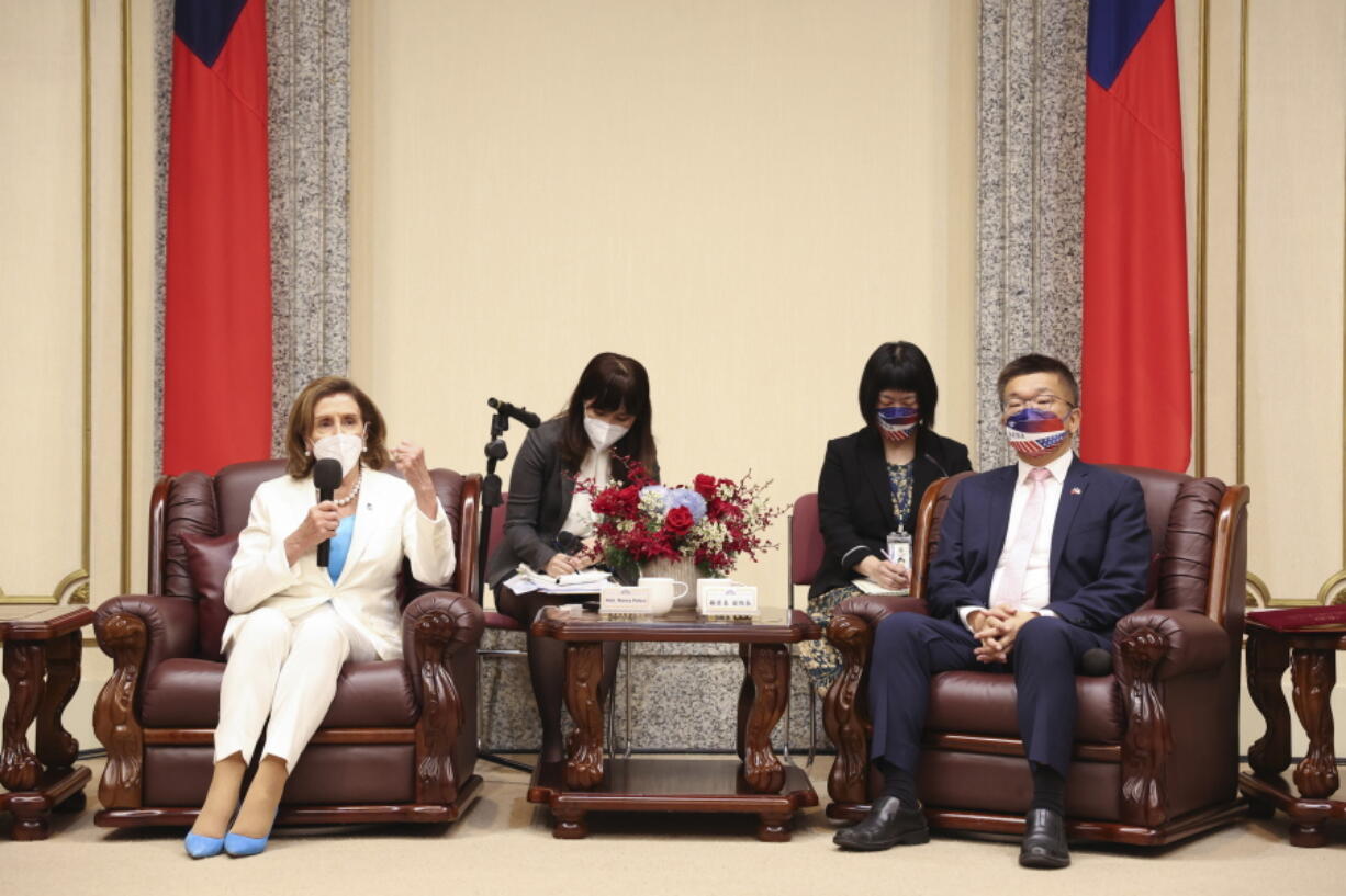 FILE - In this photo released by the Taiwan Legislative Yuan, U.S. House Speaker Nancy Pelosi, left, speaks during a meeting with Legislative Yuan Deputy Speaker Tsai Chi-chang in Taipei, Taiwan, Wednesday, Aug. 3, 2022. China announced Tuesday, Aug. 16, 2022, is imposing visa bans and other sanctions on a number of Taiwanese political figures including Tsai over their promotion of the self-governing island democracy's independence from Beijing.