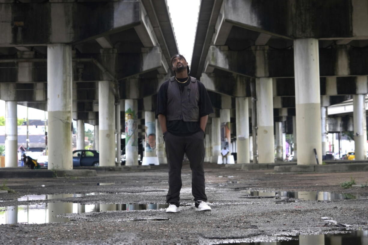 Edward Buckles, Jr., a New Orleans native who was 13 when Hurricane Katrina hit and directed the documentary "Katrina Babies," poses underneath the Claiborne Avenue overpass for a photo in the city on Friday, Aug. 19, 2022. The film looks at how a generation of New Orleans residents coming of age after Hurricane Katrina, are reconciling with the catastrophic storm that transformed their lives.