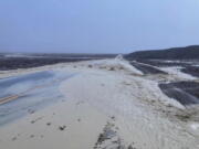 In this photo provided by the National Park Service, Highway 190 is closed due to flash flooding in Death Valley National Park, Calif., Friday, Aug. 5, 2022. Heavy rainfall triggered flash flooding that closed several roads in Death Valley National Park on Friday near the California-Nevada line. The National Weather Service reported that all park roads had been closed after 1 to 2 inches of rain fell in a short amount of time.