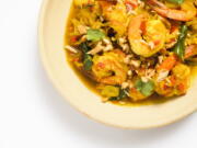 Stir-Fried Turmeric Shrimp With Shallots and Chilies.