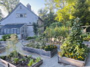 This photo shows the garden of Kyle Good and Gerald Singer in Garrison, N.Y. on Aug. 8, 2022. The couple asked their friend Jackie Grant to care for their garden during a recent vacation. (Gerald Singer via AP).