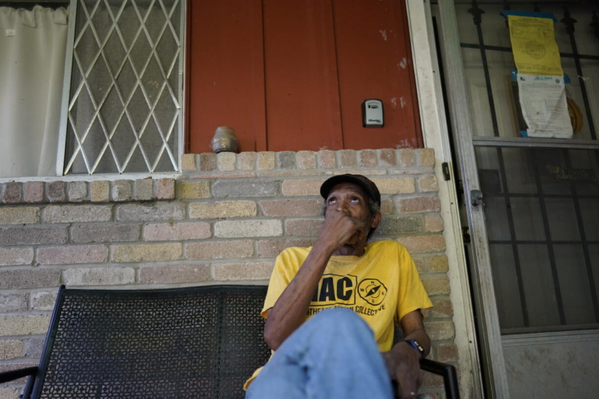 Mal Moses talks about the damage done to his home by Hurricane Harvey in 2017 and the difficulties he faced to get repairs, Thursday, Aug. 25, 2022, in Houston. A local nonprofit, West Street Recovery, ultimately helped repair his home. (AP Photo/David J. Phillip) (david j.