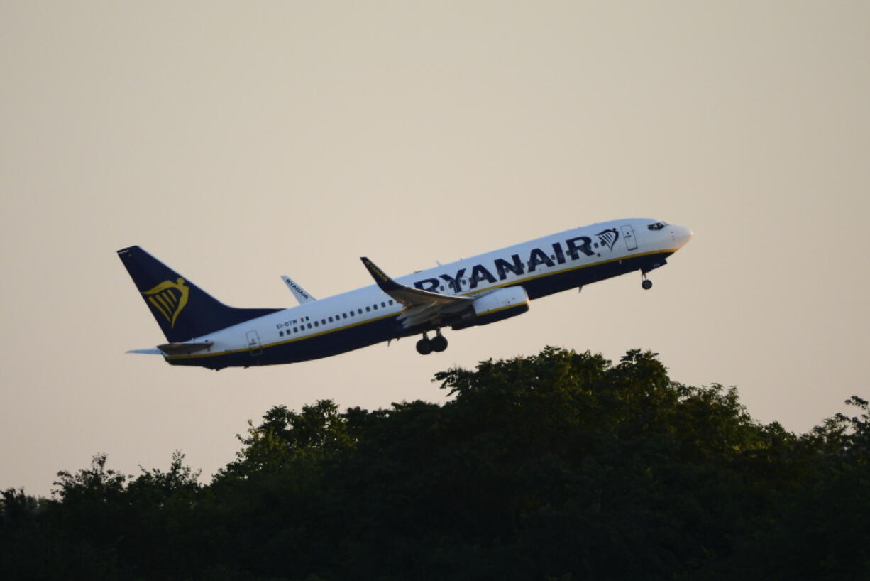 FILE - A Ryanair plane takes off from Budapest Airport, in Budapest, Hungary, June 12, 2022. Hungary has accused Ryanair of consumer protection violations after it raised ticket prices to cope with a tax on what the government calls "extra profits." Justice Minister Judit Varga wrote Monday, Aug. 8, 2022, on Facebook that an investigation found "unfair trade practices," leading to a $777,058 fine.