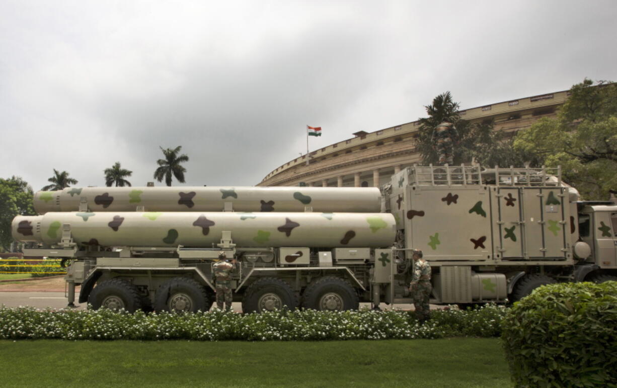 FILE - Supersonic BrahMos missiles are seen at the parliament house premises for an upcoming exhibition in New Delhi, India, on Aug. 1, 2016.  India's air force said Tuesday, Aug. 24, 2022, that three military officers have been dismissed for accidentally firing an unarmed missile into rival Pakistan in March.