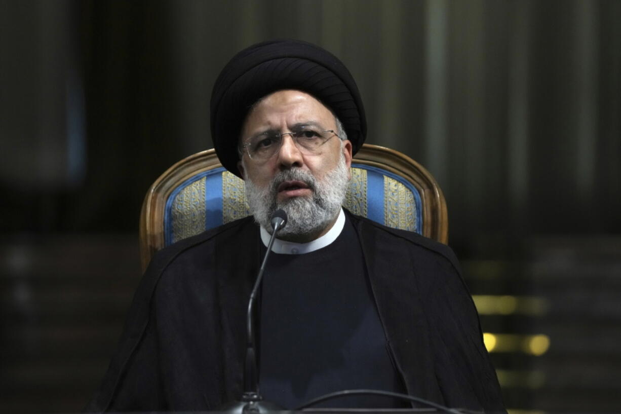 FILE - Iranian President Ebrahim Raisi speaks in a news briefing at the Saadabad Palace in Tehran, Iran, on June 11, 2022. Iran said Tuesday, Aug. 16, it submitted a "written response" to what has been described as a final roadmap to restore its tattered nuclear deal with world powers. Raisi has repeatedly tried to blame Washington for the delay in reaching an accord.