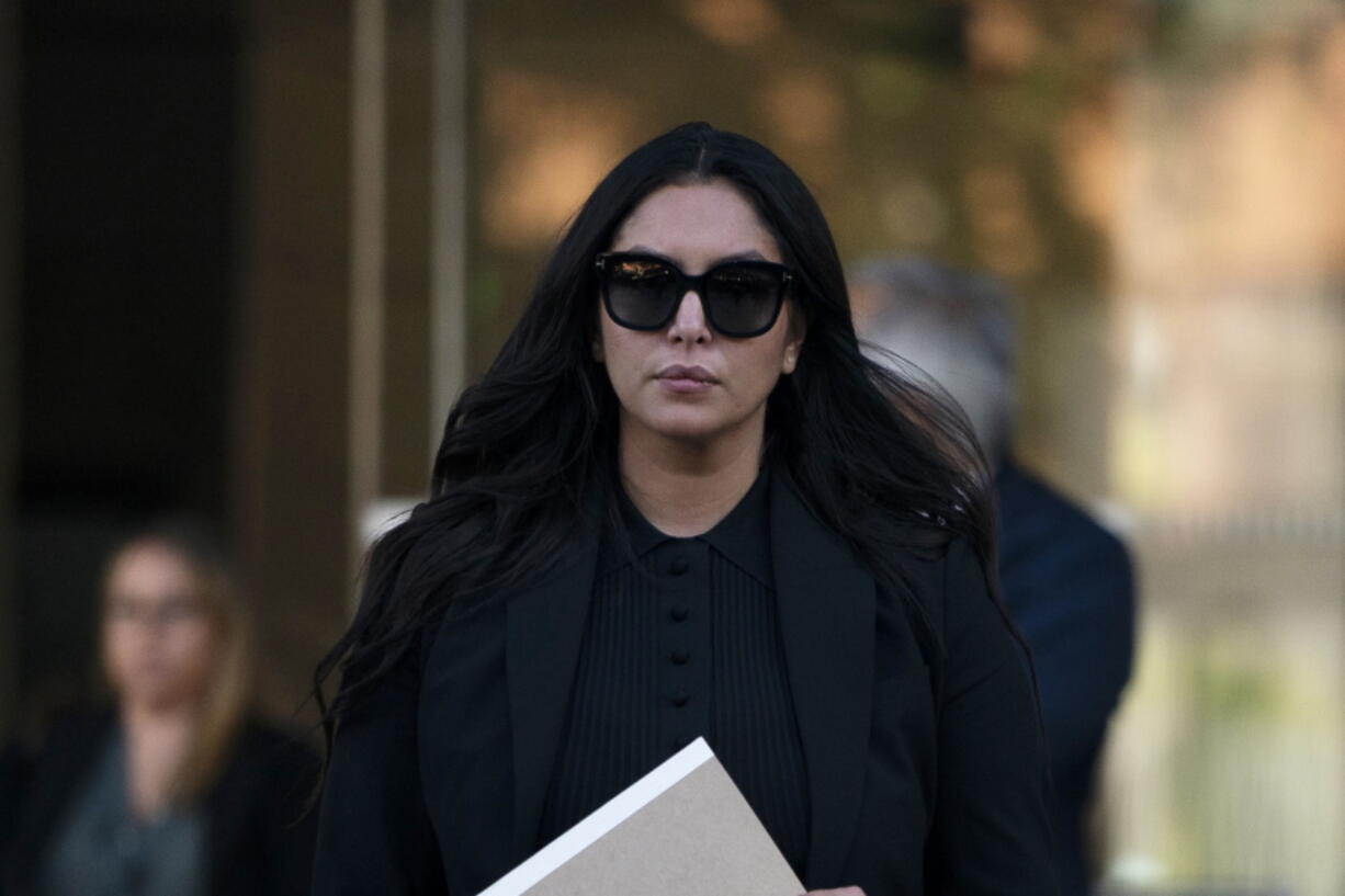 Vanessa Bryant, the widow of Kobe Bryant, leaves a federal courthouse in Los Angeles, Wednesday, Aug. 10, 2022. Kobe Bryant's widow is taking her lawsuit against the Los Angeles County sheriff's and fire departments to a federal jury, seeking compensation for photos deputies shared of the remains of the NBA star, his daughter and seven others killed in a helicopter crash in 2020. (AP Photo/Jae C.