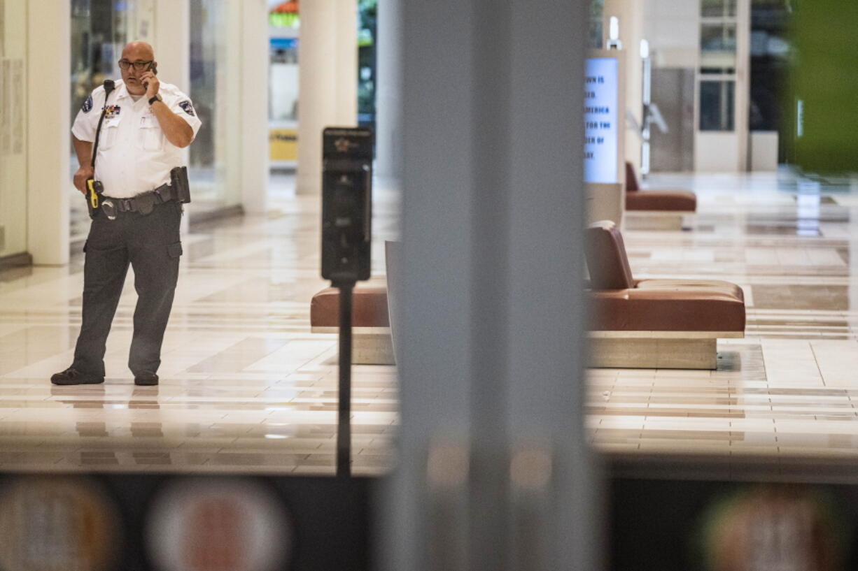 Shoppers are finally allowed to leave the Mall of America after a lockdown of several hours in Bloomington, Minn., on Thursday, Aug. 4, 2022. Police in Minnesota confirm that gunshots were fired at the Mall of America in suburban Minneapolis, but say no victim has been found.