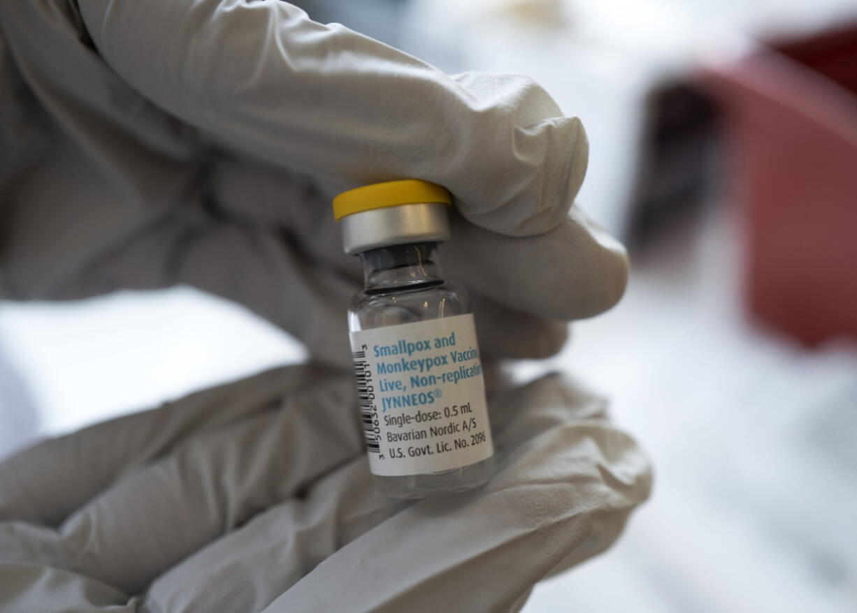 FILE - Registered pharmacist Sapana Patel holds a bottle of Monkeypox vaccine at a Pop-Up Monkeypox vaccination site on Wednesday, Aug. 3, 2022, in West Hollywood, Calif.