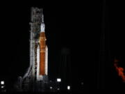 NASA's new moon rocket sits on Launch Pad 39-B hours before liftoff Monday, Aug. 29, 2022, in Cape Canaveral, Fla. This is scheduled to be the first flight of NASA's 21st-century moon-exploration program, named Artemis after Apollo's mythological twin sister.