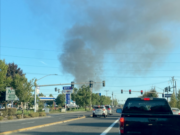 A fire on state Highway 500 sent a huge plume of smoke into the air on Friday morning.