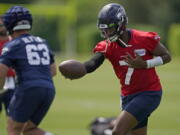 Seattle Seahawks quarterback Geno Smith (7) will likely start Saturday's preseason opener against the Pittsburgh Steelers. (Photos by Ted S.