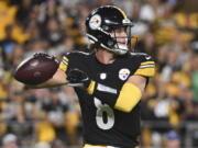 Pittsburgh Steelers quarterback Kenny Pickett looks to pass against the Seattle Seahawks during the second half of a preseason NFL football game, Saturday, Aug. 13, 2022, in Pittsburgh.