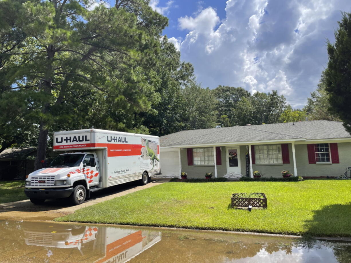 Residents in the North Canton Circle neighborhood of Jackson, Miss., on Monday, Aug. 29, 2022, were advised to evacuate from impending floodwaters. Some moved out all of their possessions in U-Haul trucks or cars.