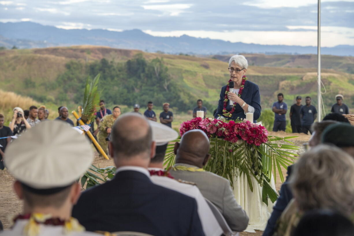 In this photo provided by the New Zealand Defence Force, U.S. Deputy Secretary of State Wendy Sherman speaks at a dawn service at Bloody Ridge as part of commemorations to mark the 80th anniversary of the Battle of Guadalcanal near Honiara, Solomon Islands, Monday, Aug. 8, 2022. A Japanese sailor was attacked during the World War II memorial service that was also attended by U.S. Deputy Secretary of State Wendy Sherman.