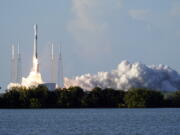 A SpaceX Falcon 9 rocket, with the Korea Pathfinder Lunar Orbiter, or KPLO, lifts off from launch complex 40 at the Cape Canaveral Space Force Station in Cape Canaveral, Fla., Thursday, Aug. 4, 2022.South Korea joined the stampede to the moon Thursday with the launch of a lunar orbiter that will scout out future landing spots.