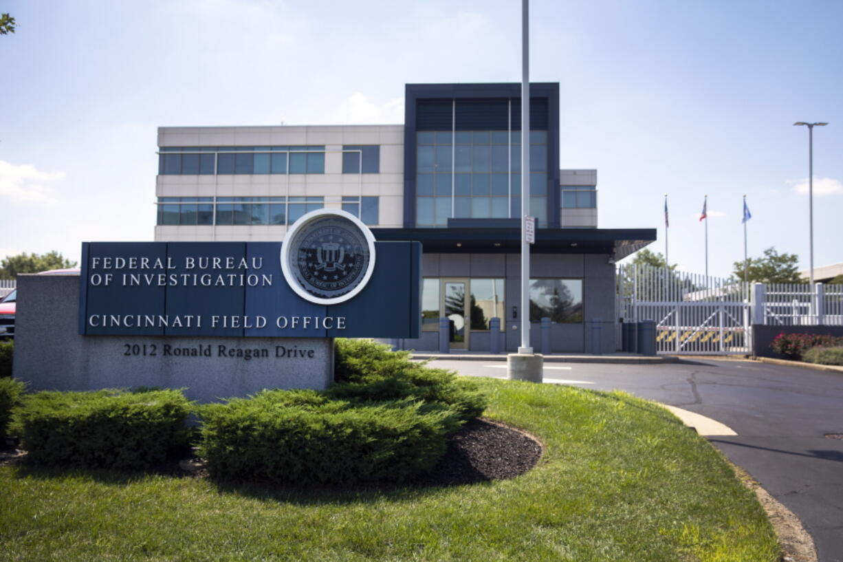 FILE - The entrance to the FBI headquarters in Cincinnati, on Aug. 11, 2022. An armed man decked out in body armor tried to breach a security screening area at the FBI field office. Federal authorities and experts who study online extremism are warning of the risk of additional attacks on federal law enforcement following the FBI's search of ex-President Donald Trump's Florida home, Mar-a-Lago.