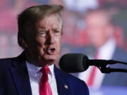 FILE - Former President Donald Trump speaks at a rally Friday, Aug. 5, 2022, in Waukesha, Wis. The FBI search of Trump's Mar-a-Lago estate marked a dramatic and unprecedented escalation of the law enforcement scrutiny of the former president, but the Florida operation is just one part of one investigation related to Trump and his time in office.