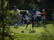 Union's Laredo Maldonado hits a tee shot on the No. 7 hole during the high school boys golf match between Ridgefield and Union at Camas Meadows Golf Course on Monday, Aug. 29, 2022.