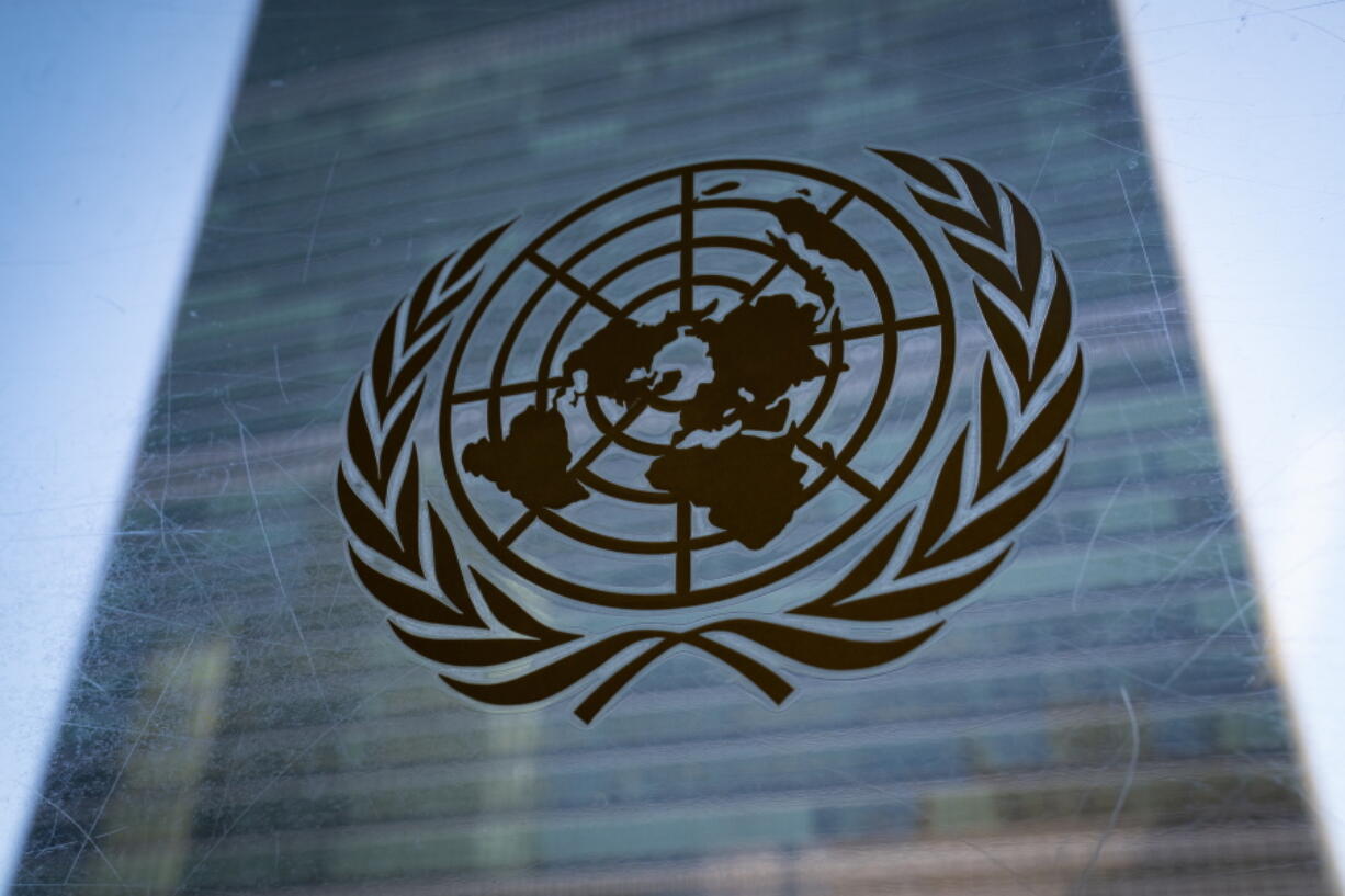 FILE - The symbol of the United Nations is displayed outside the Secretariat Building during an emergency meeting of the UN General Assembly, Monday, Feb. 28, 2022, at the United Nations Headquarters, in New York. As 191 countries approach the end to a four-week conference to review the landmark U.N. treaty aimed at curbing the spread of nuclear weapons, Russia's invasion of Ukraine and takeover of Europe's largest nuclear power plant and rivalries between the West and China were posing key obstacles to agreement on a final document.