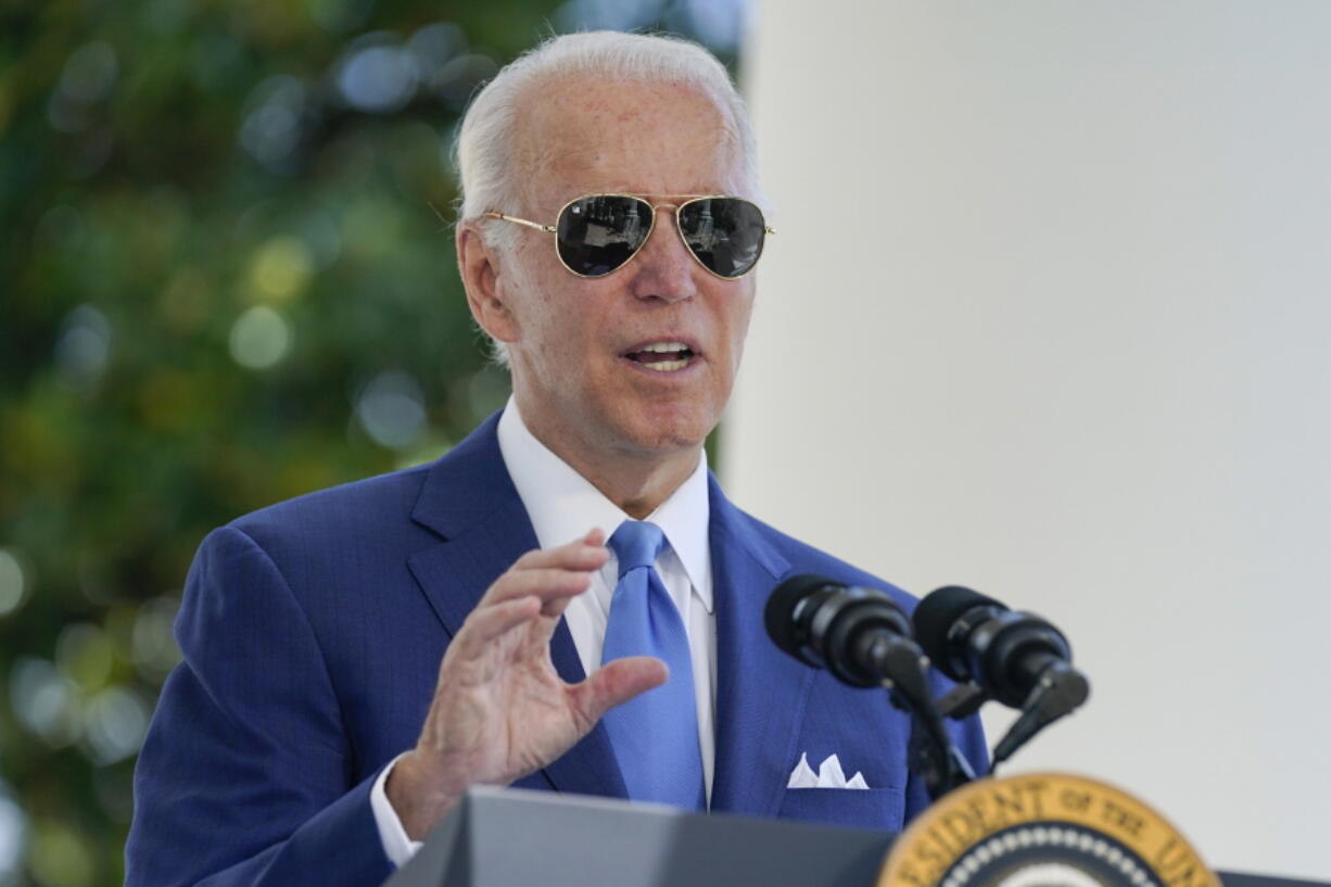 FILE - President Joe Biden speaks before signing two bills aimed at combating fraud in the COVID-19 small business relief programs Friday, Aug. 5, 2022, at the White House in Washington. Biden tested negative for COVID-19 on Saturday morning but will continue to isolate until a second negative test, his doctor said.