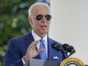 FILE - President Joe Biden speaks before signing two bills aimed at combating fraud in the COVID-19 small business relief programs Friday, Aug. 5, 2022, at the White House in Washington. Biden tested negative for COVID-19 on Saturday morning but will continue to isolate until a second negative test, his doctor said.