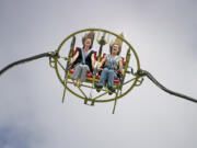 The Slingshot hurls riders high into the air at the Clark County Fair.