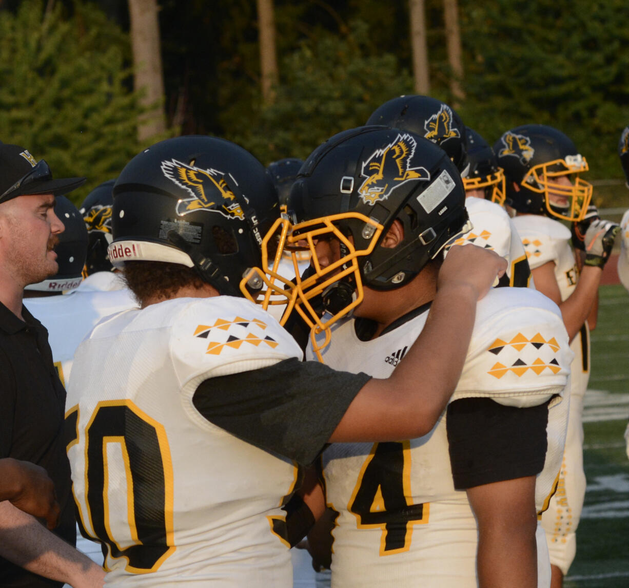 Hudson's Bay freshman Artie Berry (left) and junior Isias Antonio celebrate after the Eagles' 53-6 win over Heritage on Friday, Sept. 2, 2022.