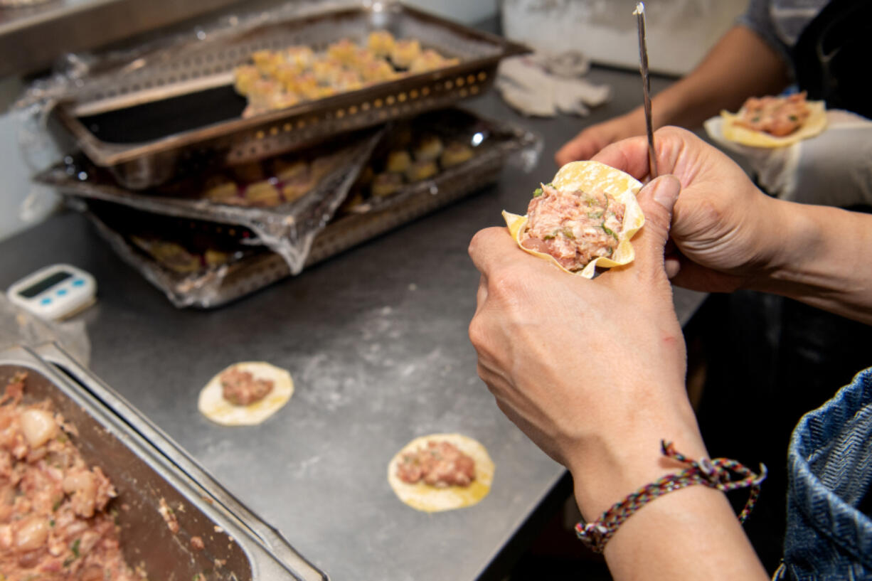 Shirley Chung, chef and owner of Ms. Chi, works her magic preparing dumplings in Culver City, Calif.