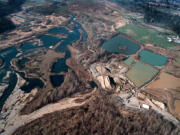 The Storedahl Gravel Pit and the old Ridgefield Pits, seen in February 2000, where the East Fork Lewis River has been severely altered, affecting the river downstream in profound ways.