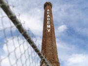 Deconstruction of the old brick Providence Academy smokestack, a landmark of Vancouver, is set to begin Tuesday.