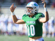 Mountain View senior Mitch Johnson pumps up the team after a score Friday, Sept. 9, 2022, during a game at McKenzie Stadium.