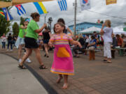 Tova D., 4, of Ridgefield dances to the music of Melao de Cuba at the Ridgefield Multicultural Festival in 2022.