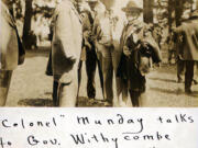 James A. Munday, a Civil War Confederate cavalryman and prisoner of war, was a short man who had a big effect on Clark County. He championed better roads, the Interstate Bridge, and the construction of a port along the Columbia River. In this photo, "Colonel" Munday, right, speaks with Oregon Gov. James Withycombe, left, and Henry Pittock, center, Oregonian publisher, at the Dalles-Celilo Canal Opening Celebration in May 1915.