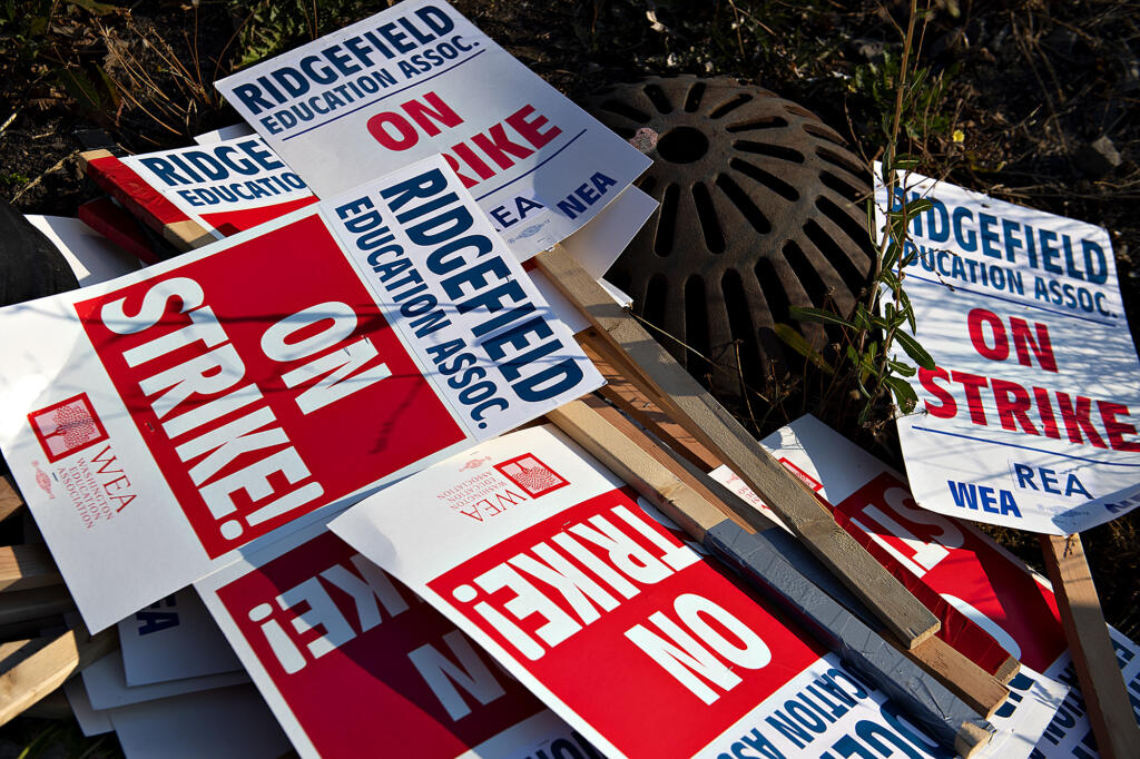 Union members and community members gather to strike after a deal has not been reached between the teachers union and school officials despite working without a contract since Sep. 1, as seen Friday morning, Sept. 9, 2022.