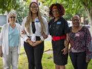 Odyssey World International Education Services board member Rheta Rubenstein, from left, administrative assistant Miracle Joslin, founder and executive director Karen Morrison, and board member Pandora Pierce stand for a portrait outside RichlandHub Coffee Shop.