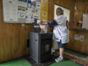 General manager Brian Taylor loads a pellet stove at Morton's Stoves, Pools, and Spas. Russia contributed 2 million tons of wood pellets to the global market in 2020, according to the Pellet Fuels Institute. This made the country the second largest producer of wood pellets globally, second to American manufacturers. But sanctions and restrictions from the war in Ukraine mean there will be a large gap in the market.