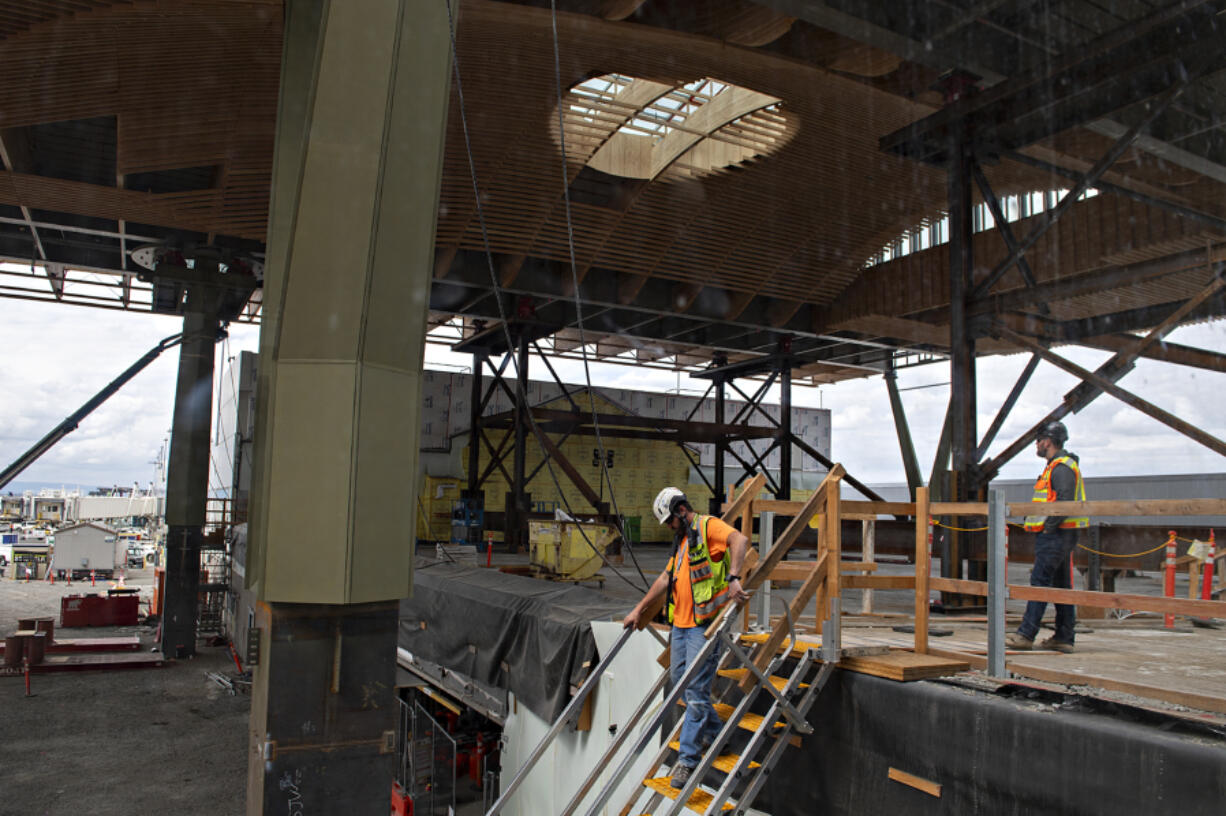 The new 392,000-square-foot Portland International Airport roof contains many skylights designed to bring a lot of natural light into the space.