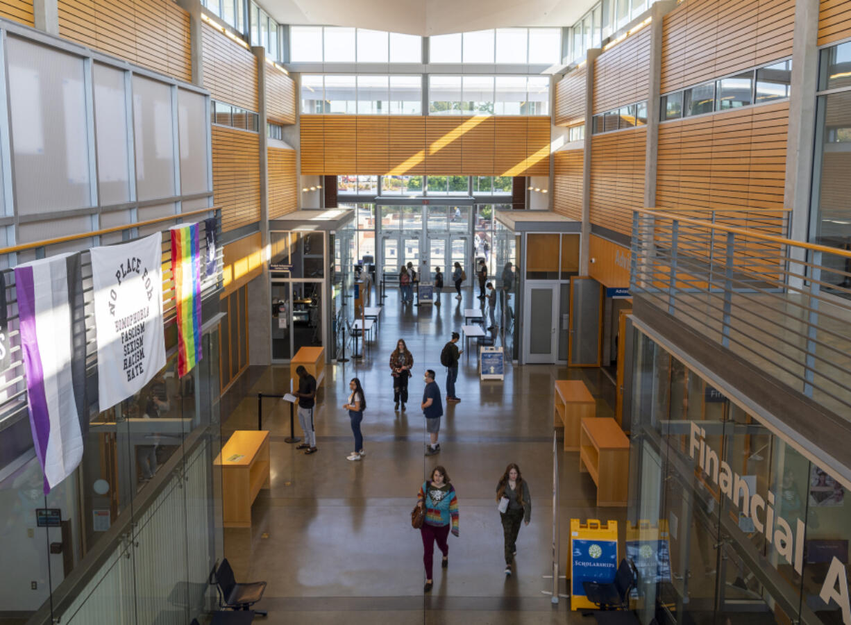 People walk through Gaiser Hall on Monday during the first day of classes at Clark College.