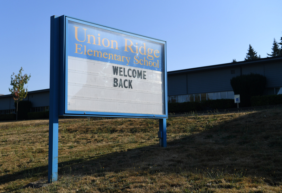 A sign welcomes students on Monday at Union Ridge Elementary School in Ridgefield. Classes began after a tentative agreement was reached between the Ridgefield School district and the Ridgefield Education Association on Sunday evening.