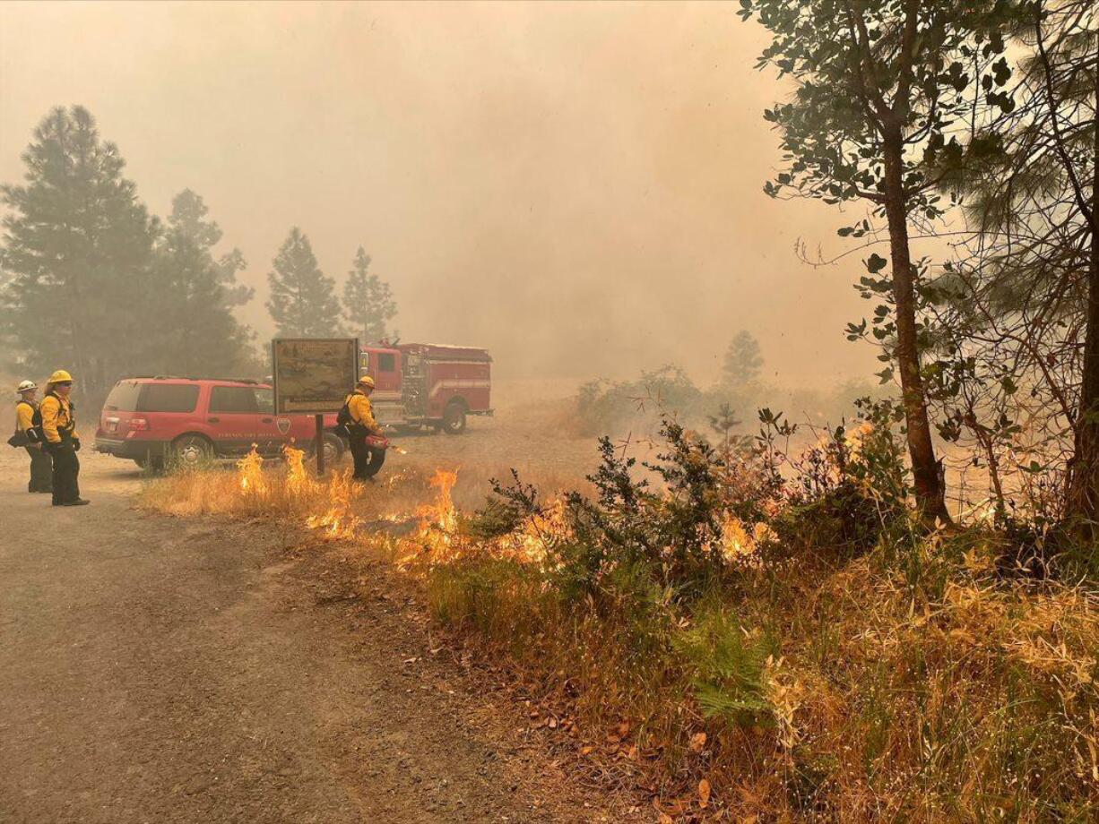 Burnout along Galice Road to help protect structures, Aug. 30.